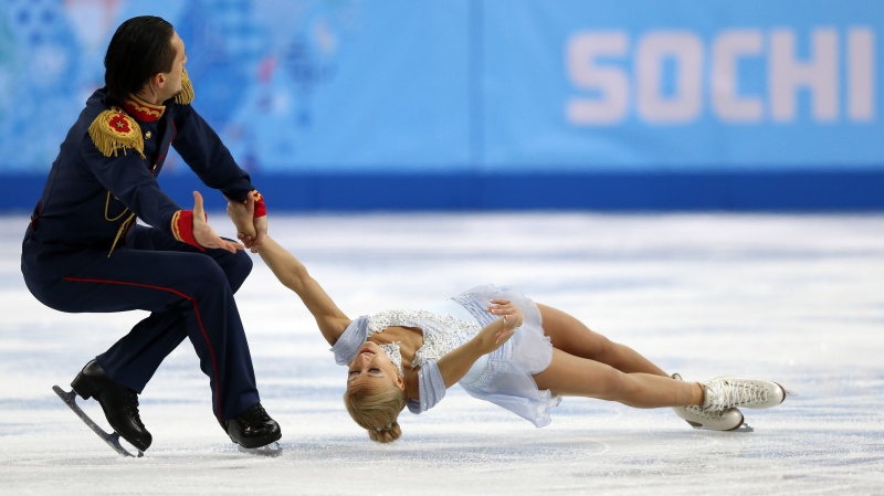 Tatiana Volosozhar şi Maxim Trankov - Foto: zastavki.com